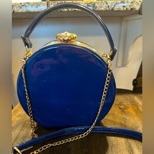 Elegant Blue Handbag with Gold Accents